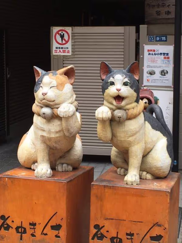 Tokyo Private Tour - Two "Maneki-neko", meaning beckoning cats, kind of lucky charm, believed to bring much happiness or money