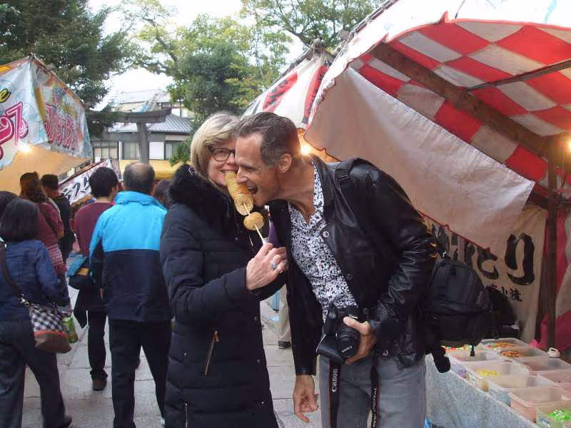 Kyoto Private Tour - A quick bite at stalls lining a passgeway in the precincits of Fushimi-Inari shrine, Kyoto city, Kyoto