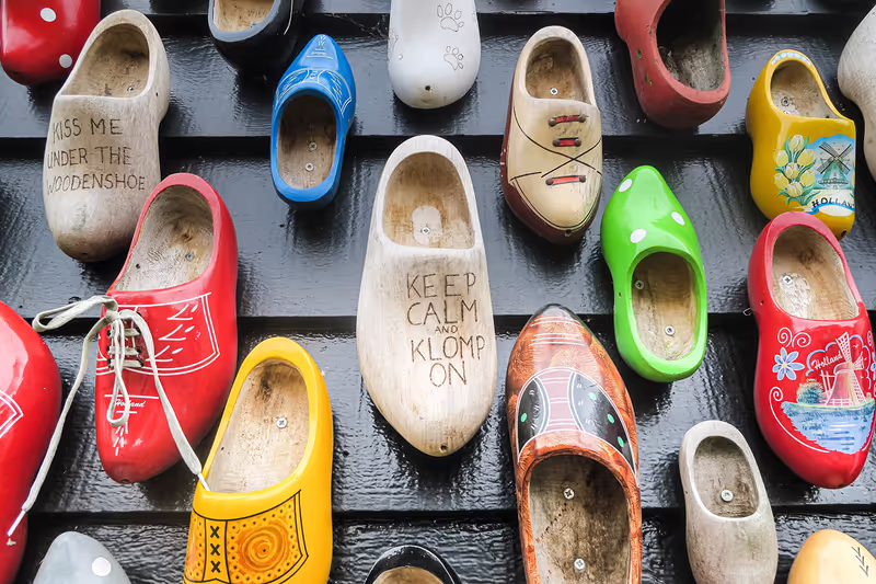 Amsterdam Private Tour - A wall of Dutch wooden shoes in Zaanse Schans