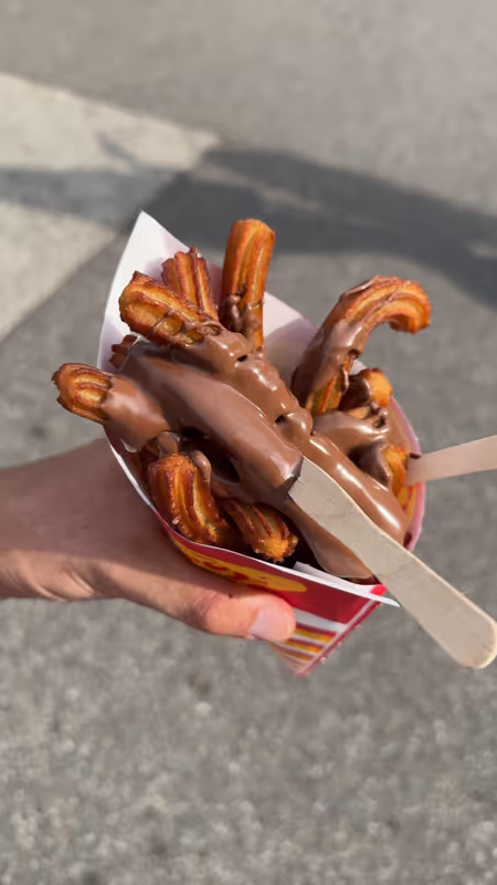 Amsterdam Private Tour - Fresh churros from a local street vendor