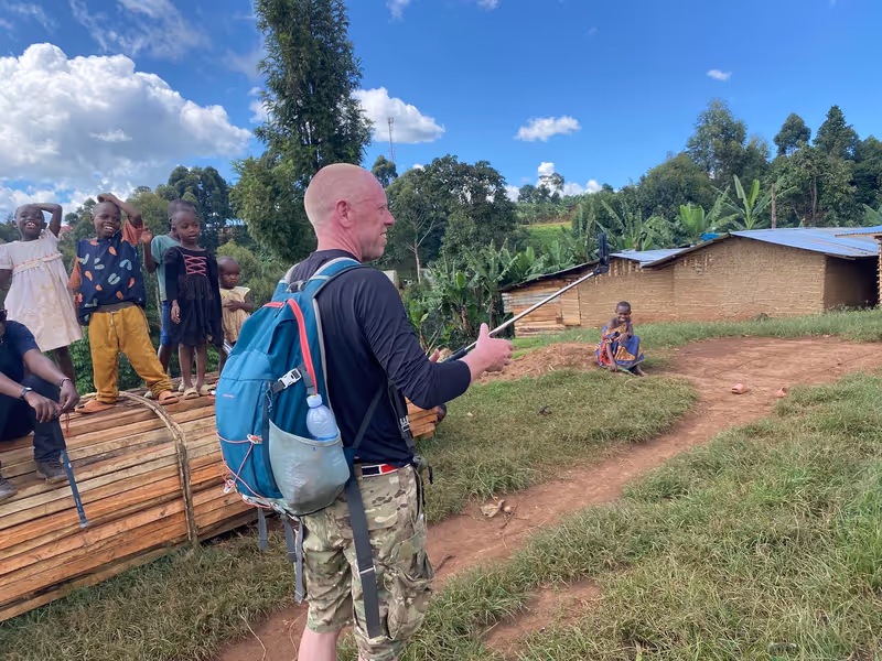 Mbale Private Tour - Visitor having good time with local children