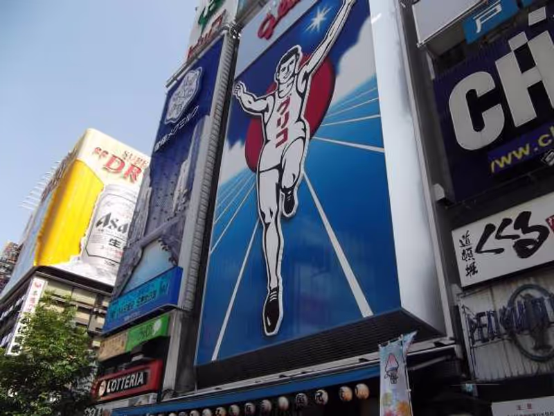 Osaka Private Tour - "Glico" Man, a signboard advertising a confectioner, Glico Corporation.