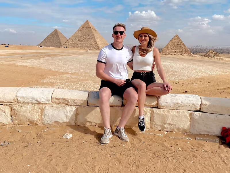 Giza Private Tour - Giza pyraGiza Pyramids and the Great Sphinx, the most famous monuments of ancient world! These massive stone structures were built around 4,500 years ago on a rocky desert plateau close to the Nile and always amaze visitors.mids