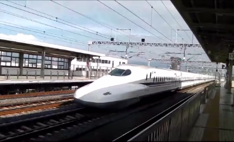 Hakone Private Tour - The Shinkansen passing by at Odawara station without slowing down